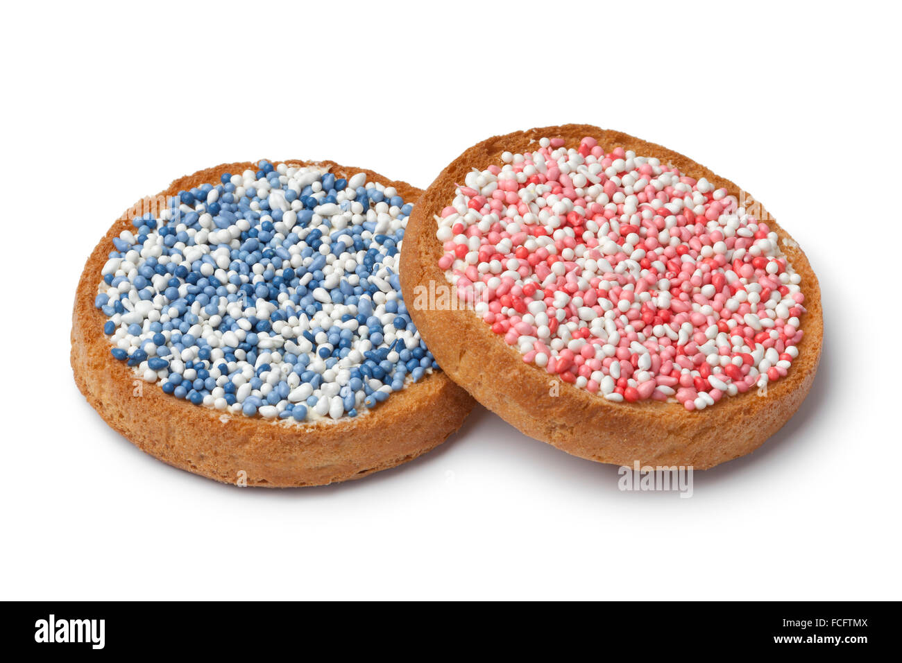 "Beschuit met muisjes, un tradizionale trattamento per festeggiare la nascita di un bambino nei Paesi Bassi. Spruzzi di rosa per una ragazza, blu Foto Stock