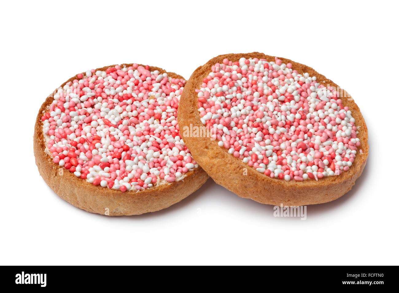 "Beschuit met muisjes, un tradizionale trattamento per festeggiare la nascita di un bambino nei Paesi Bassi. Rosa per una ragazza Foto Stock