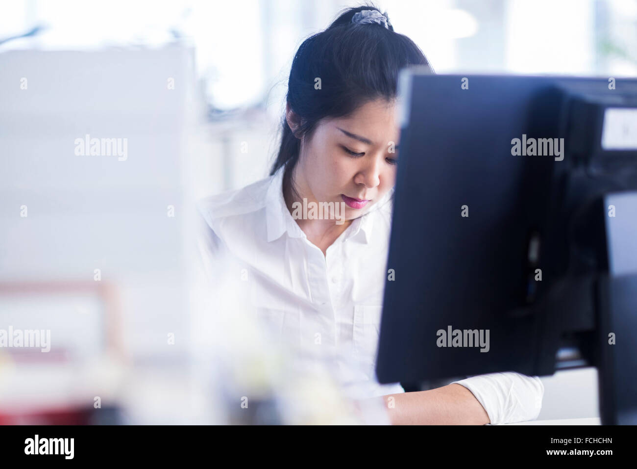Cinese ufficio lavoratore lavora nel business aziendale Foto Stock