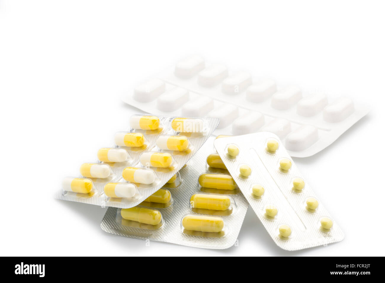 Capsule giallo pillola confezione in blister Foto Stock