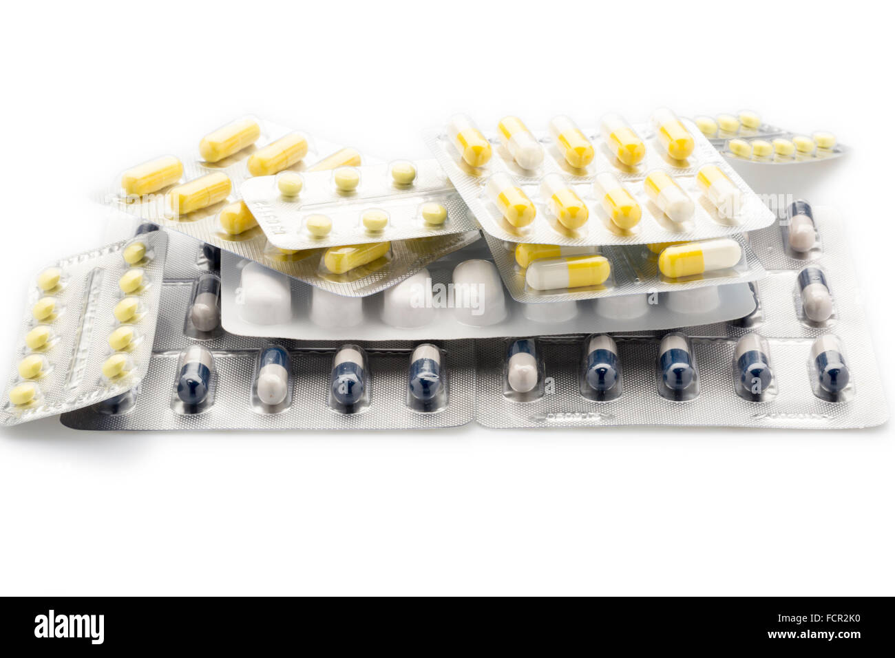 Mucchio di confezioni blister di coloratissimi pillole e capsule Foto Stock
