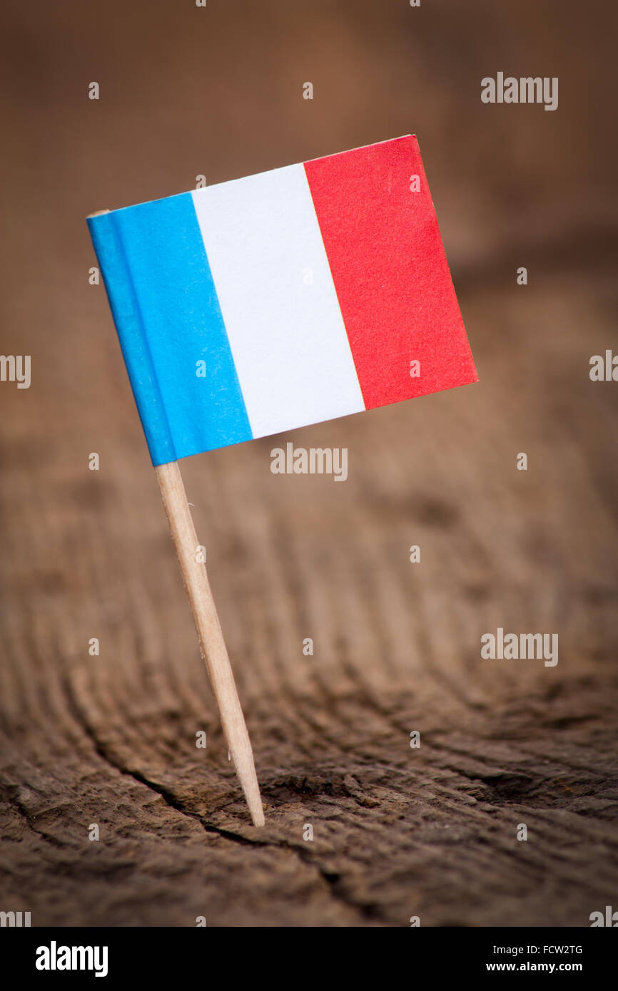 Stilizzata bandiera della Francia su sfondo di legno Foto Stock