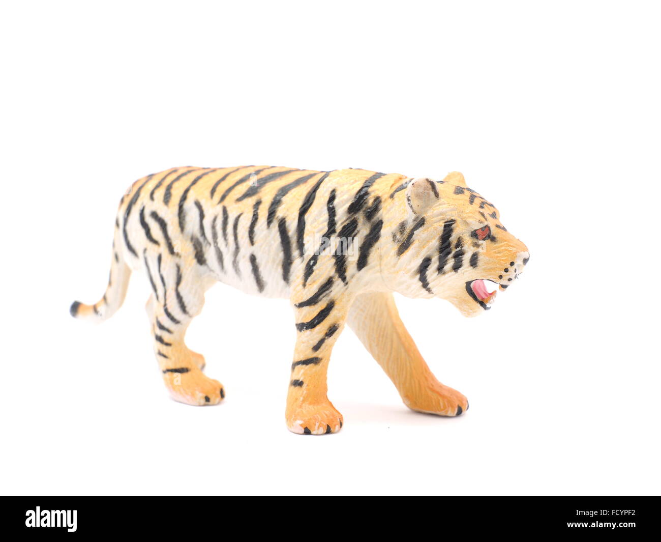 Toy tiger su sfondo bianco Foto Stock