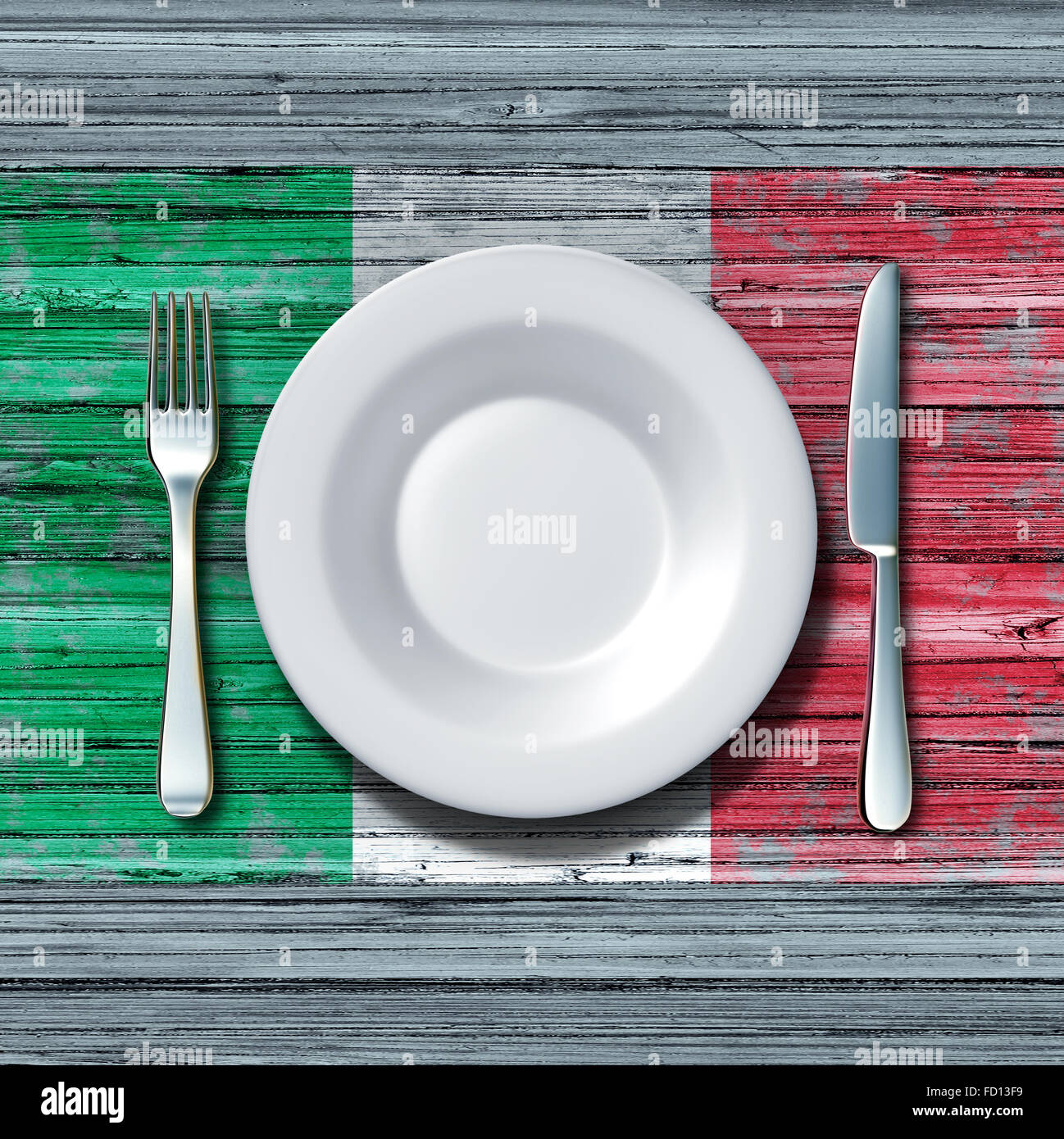 Cucina italiana il concetto di cibo come un luogo impostazione con coltello e forchetta su un vecchio rustico tavolo in legno con un simbolo di bandiera dell'Italia come una icona della tradizionale della regione mediterranea famiglia mangiare in Italia. Foto Stock