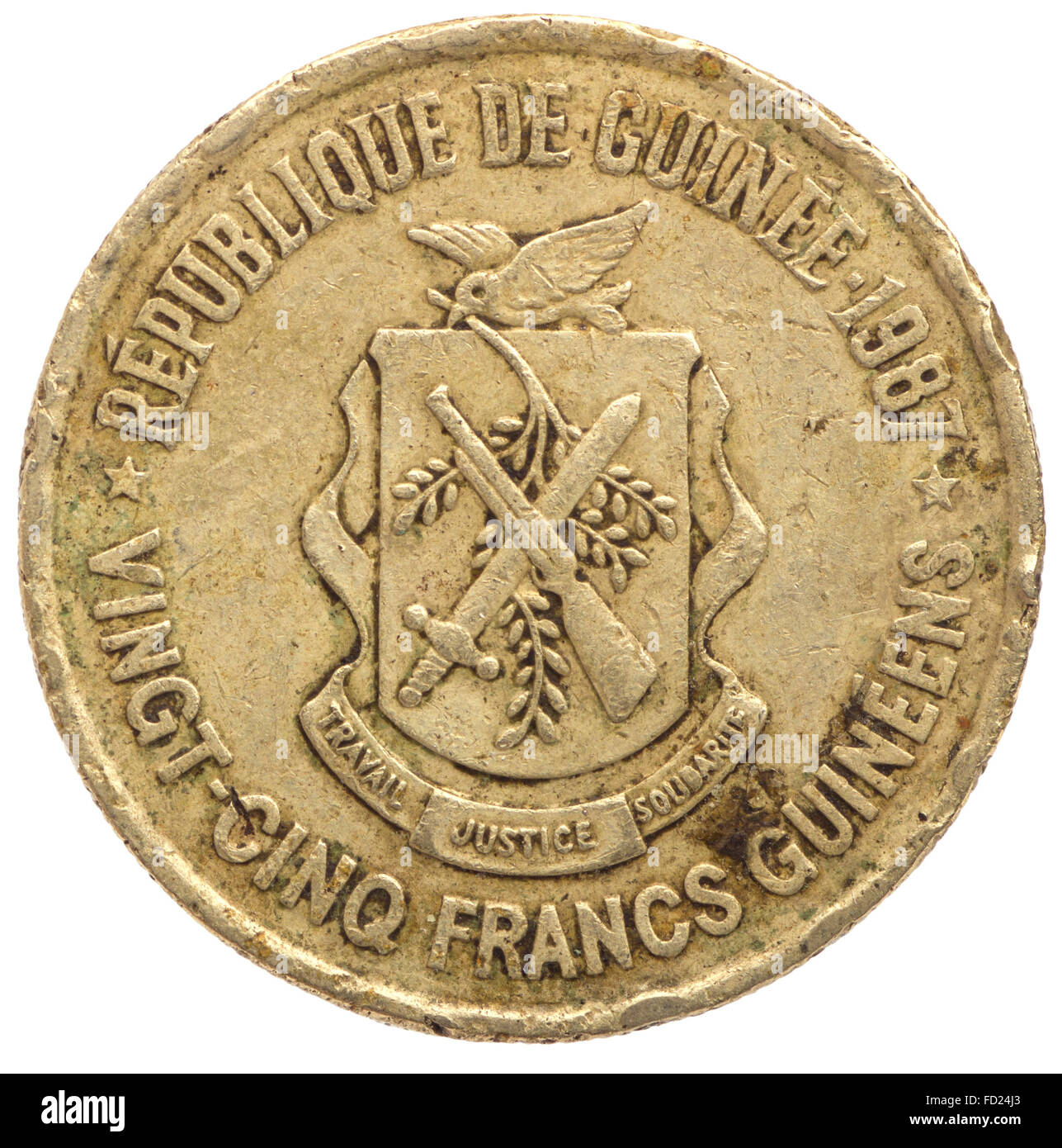 25 franchi guineani coin, 1987, retromarcia, isolati su sfondo bianco Foto Stock
