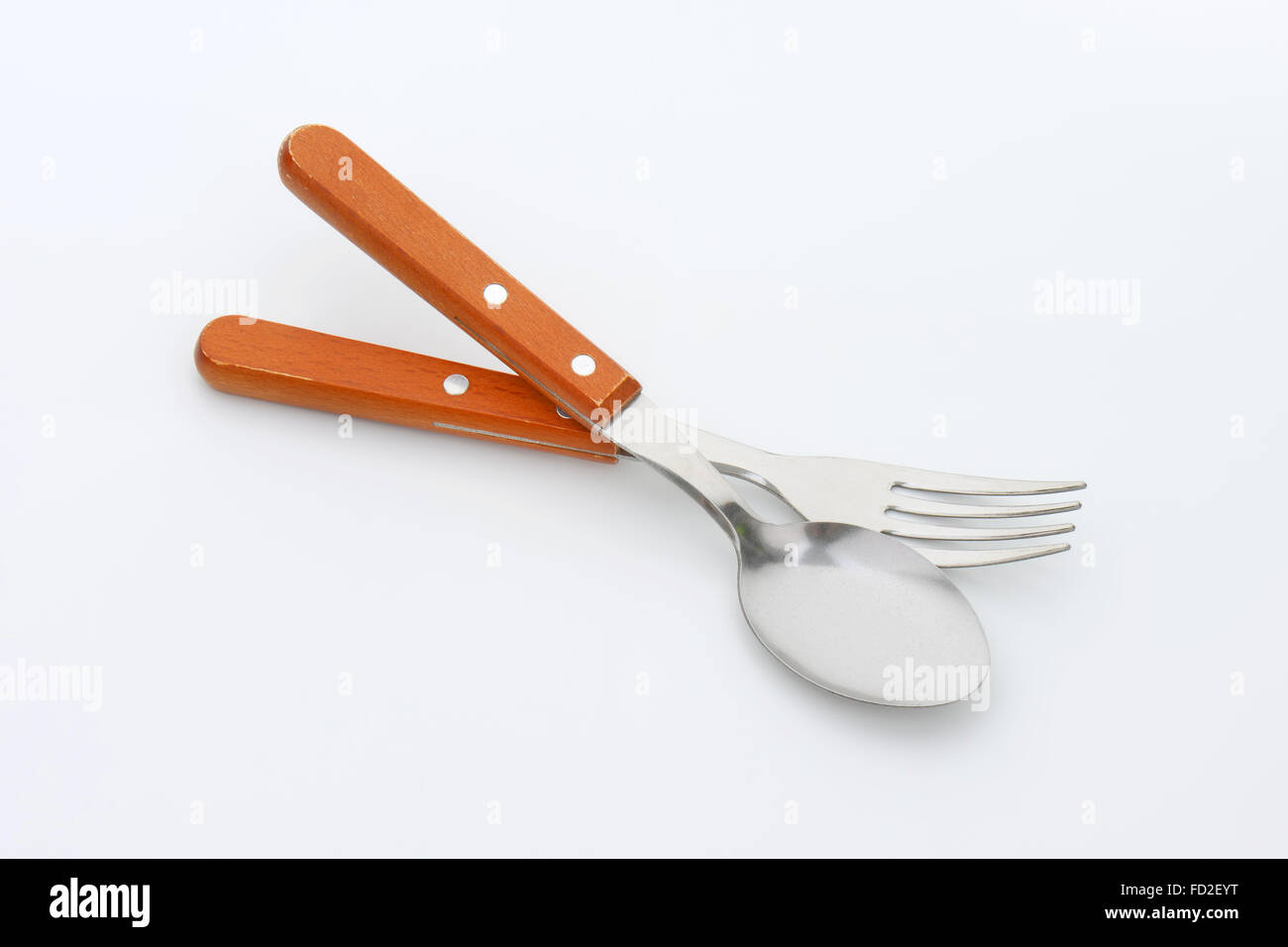 La cena cucchiaio e forchetta con impugnature in legno Foto Stock