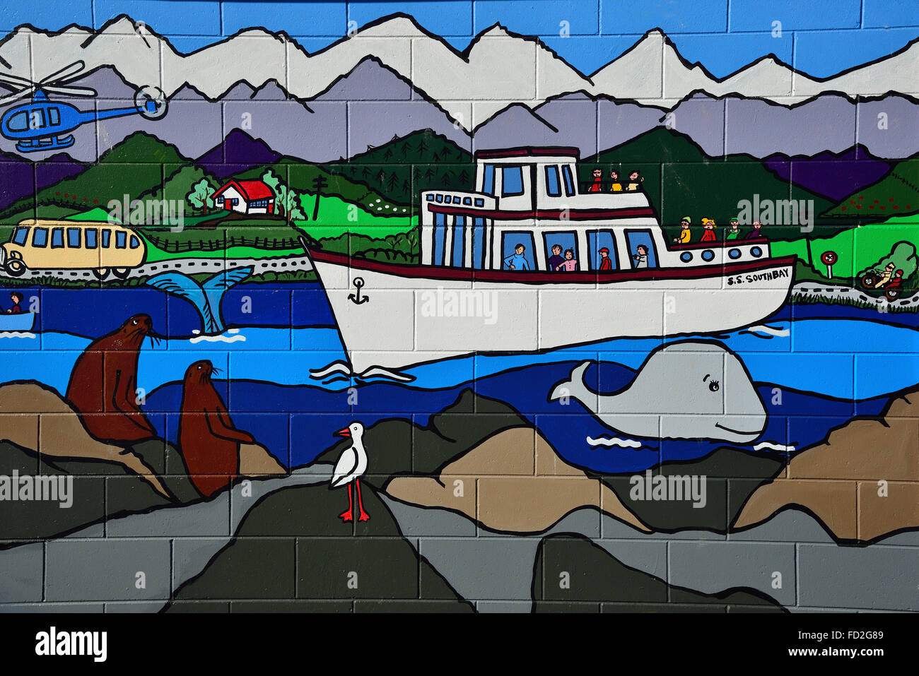 Murale colorato su una parete della città costiera di Kaikoura sull'Isola del Sud, Nuova Zelanda Foto Stock