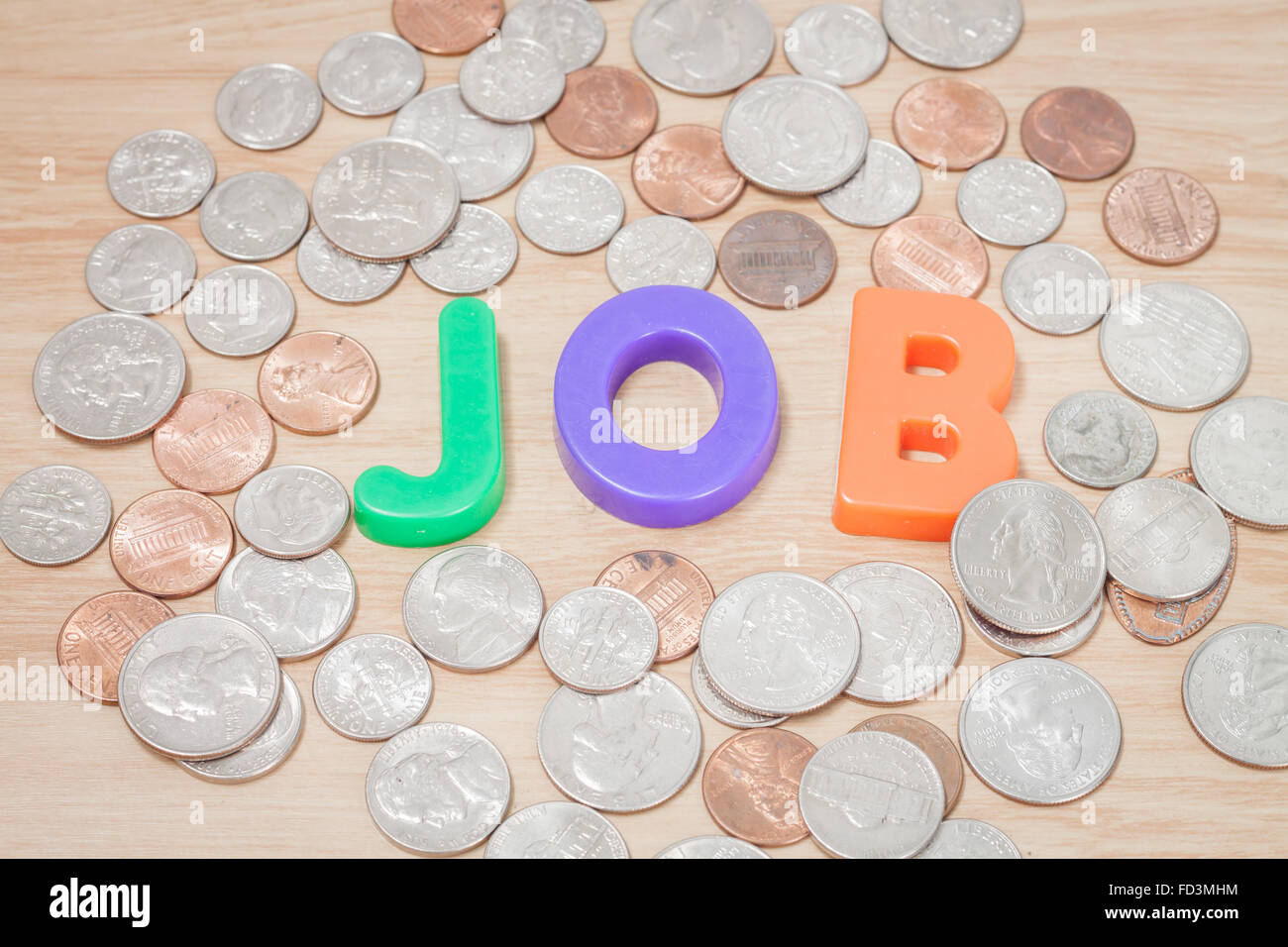 Alfabeto di lavoro con varie monete statunitensi, stock photo Foto Stock