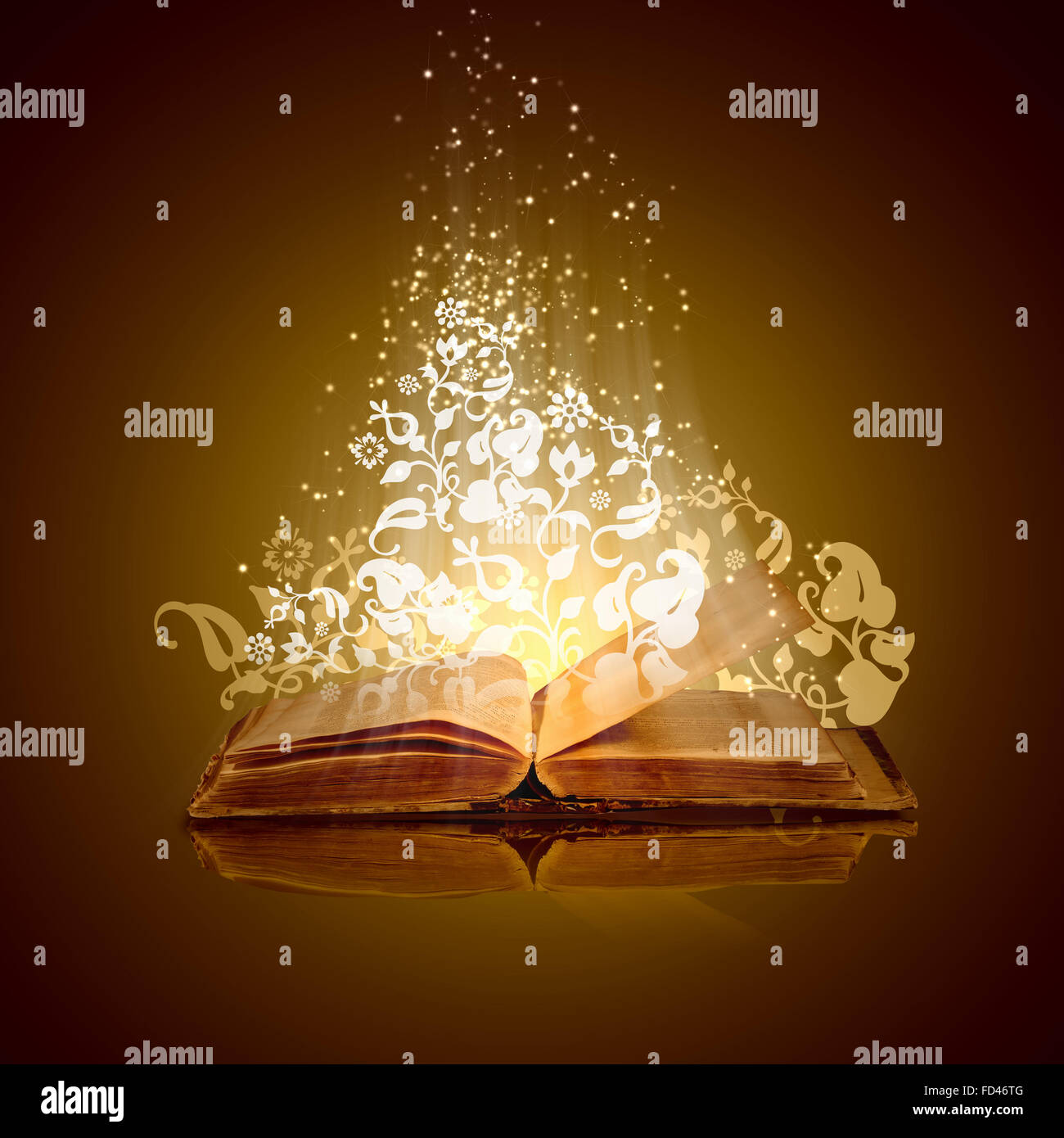 Immagine di aperto libro magico con delle luci magiche Foto stock - Alamy