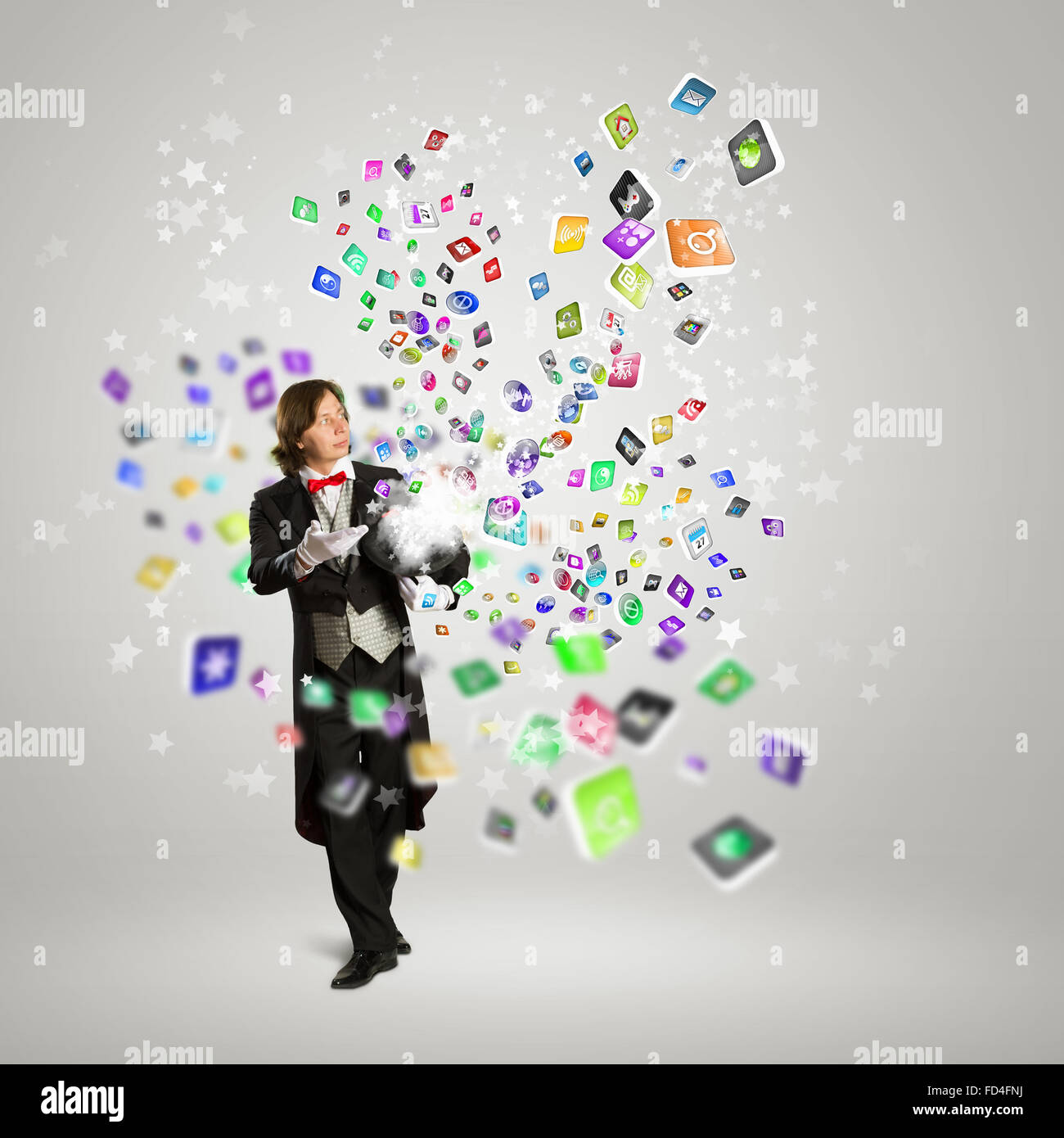 Immagine del mago con il cappello e icone multimediali volare in aria Foto Stock