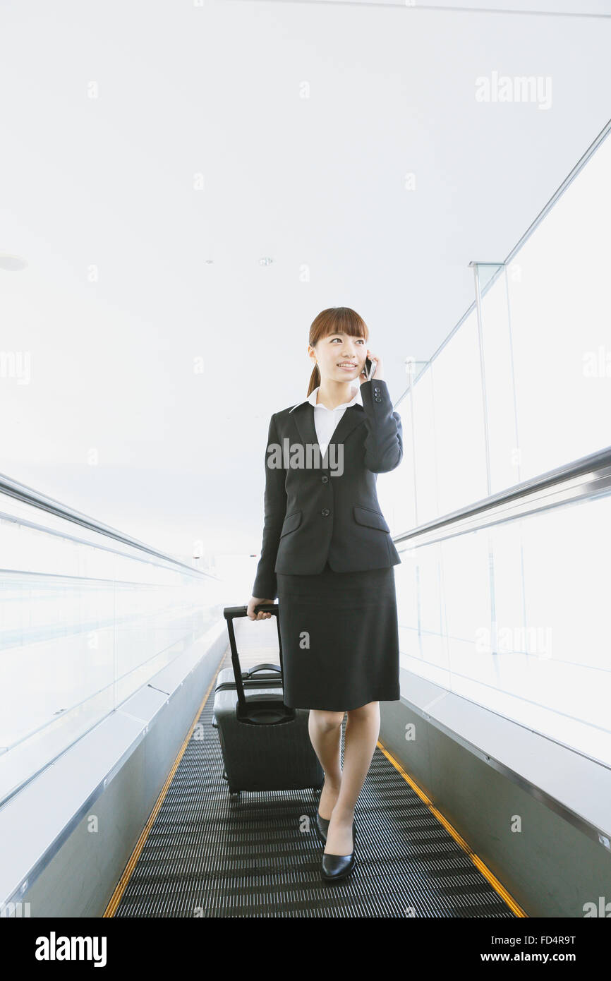 Imprenditrice all'aeroporto Foto Stock