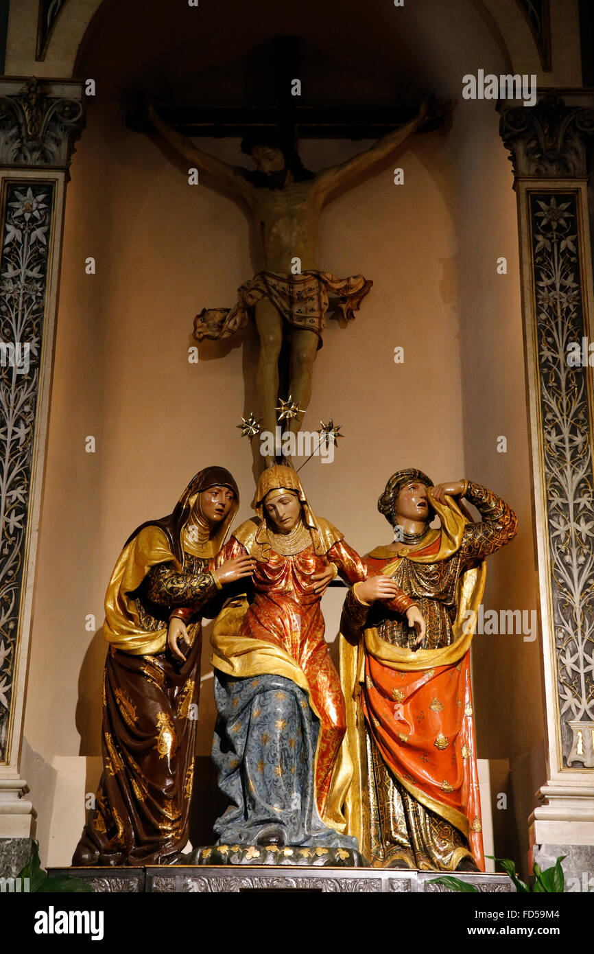 Le statue di San Vittore la basilica, Varese. Lamento ai piedi della croce. Foto Stock