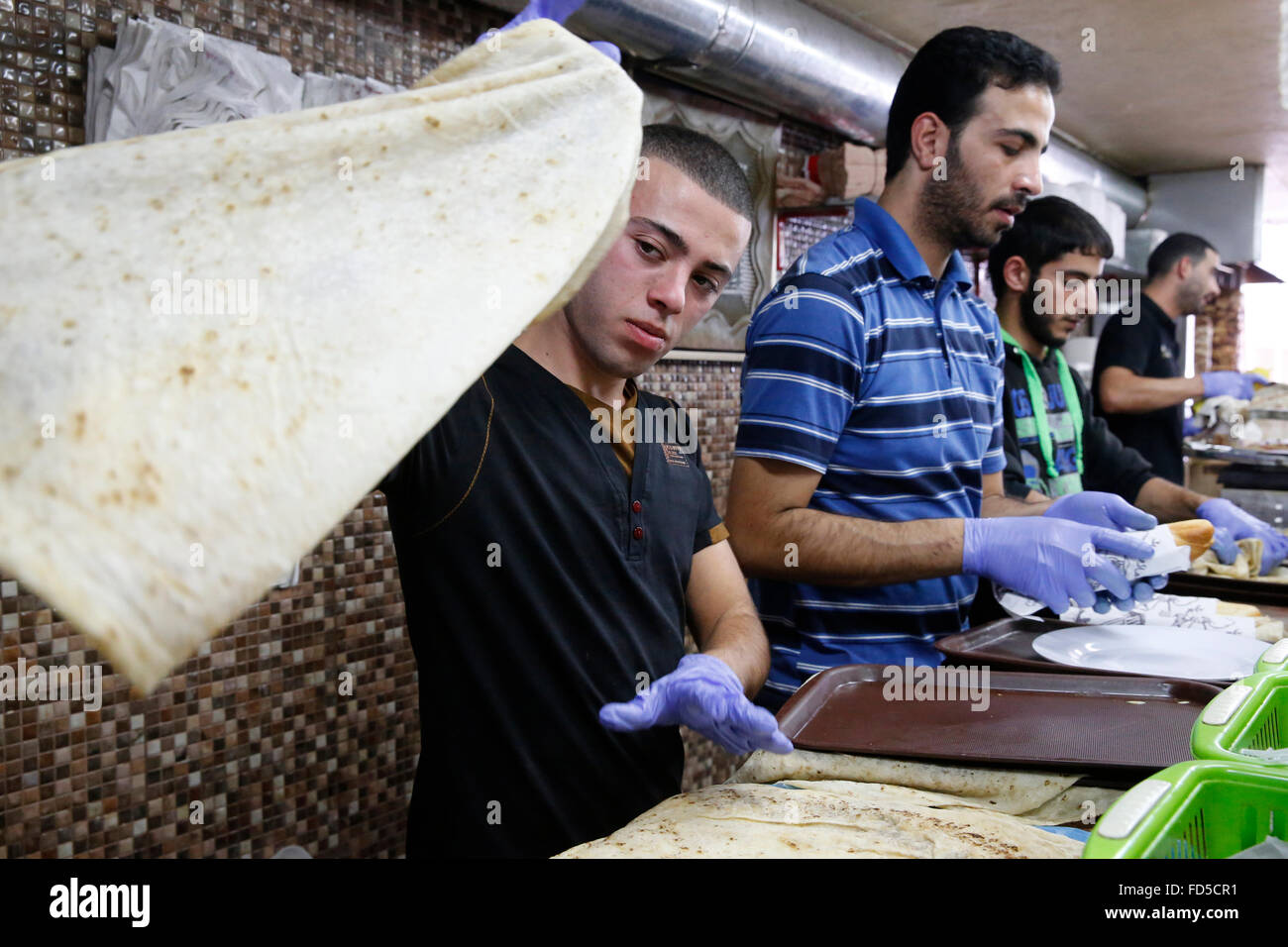 Ristorante i lavoratori a Hebron, West Bank. Foto Stock