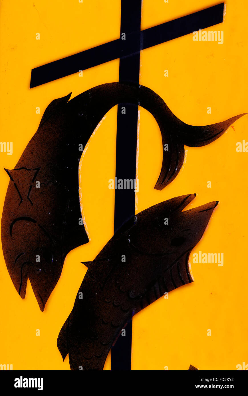 Simboli religiosi. Pesce e croce. Foto Stock