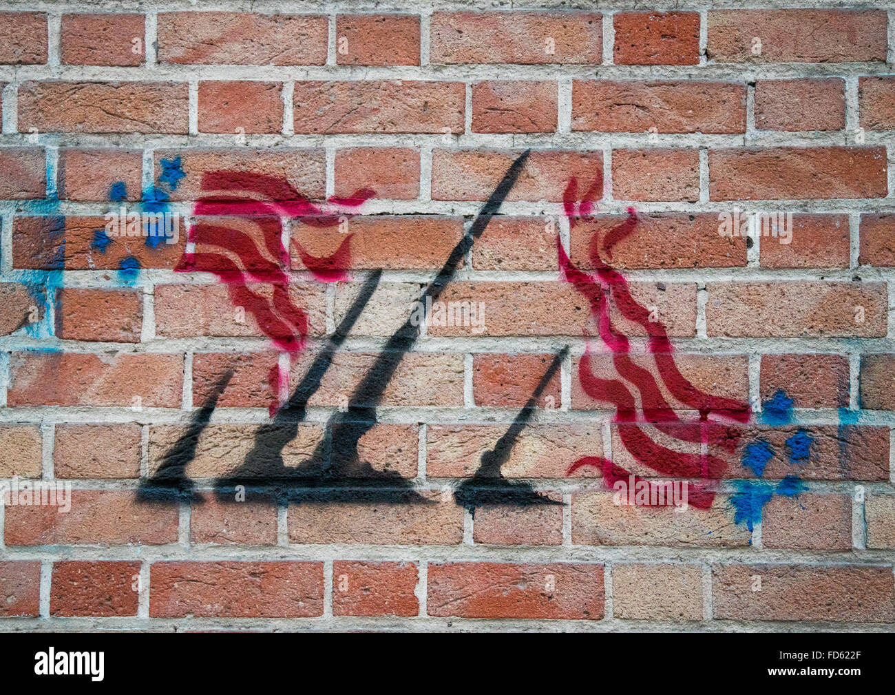 Anti-americano di propaganda murale sulla parete della ex ambasciata degli Stati Uniti, il distretto centrale, Teheran, Iran Foto Stock