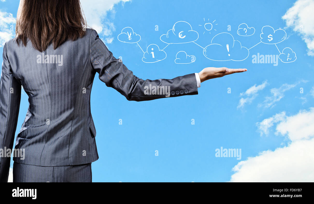 Stretta di mano imprenditore e simboli di business Foto Stock