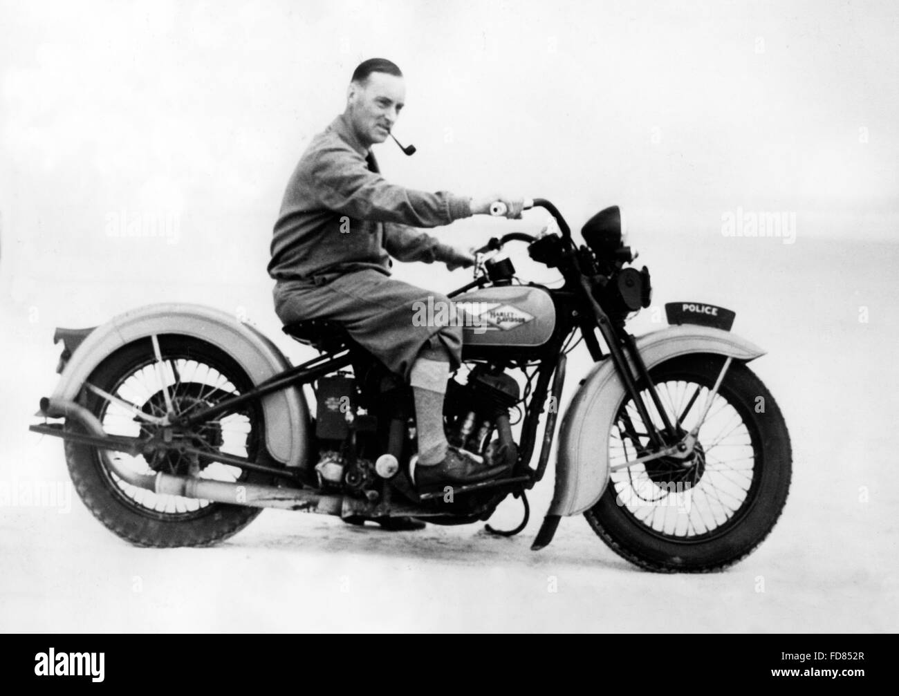 Sir Malcolm Campbell su un motociclo, 1935 Foto Stock