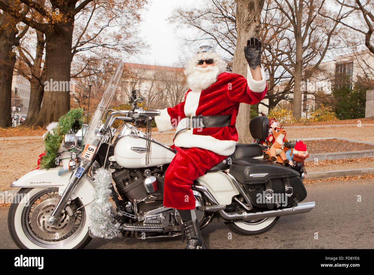 Babbo Natale a cavallo di un Harley Davidson Moto - USA Foto Stock
