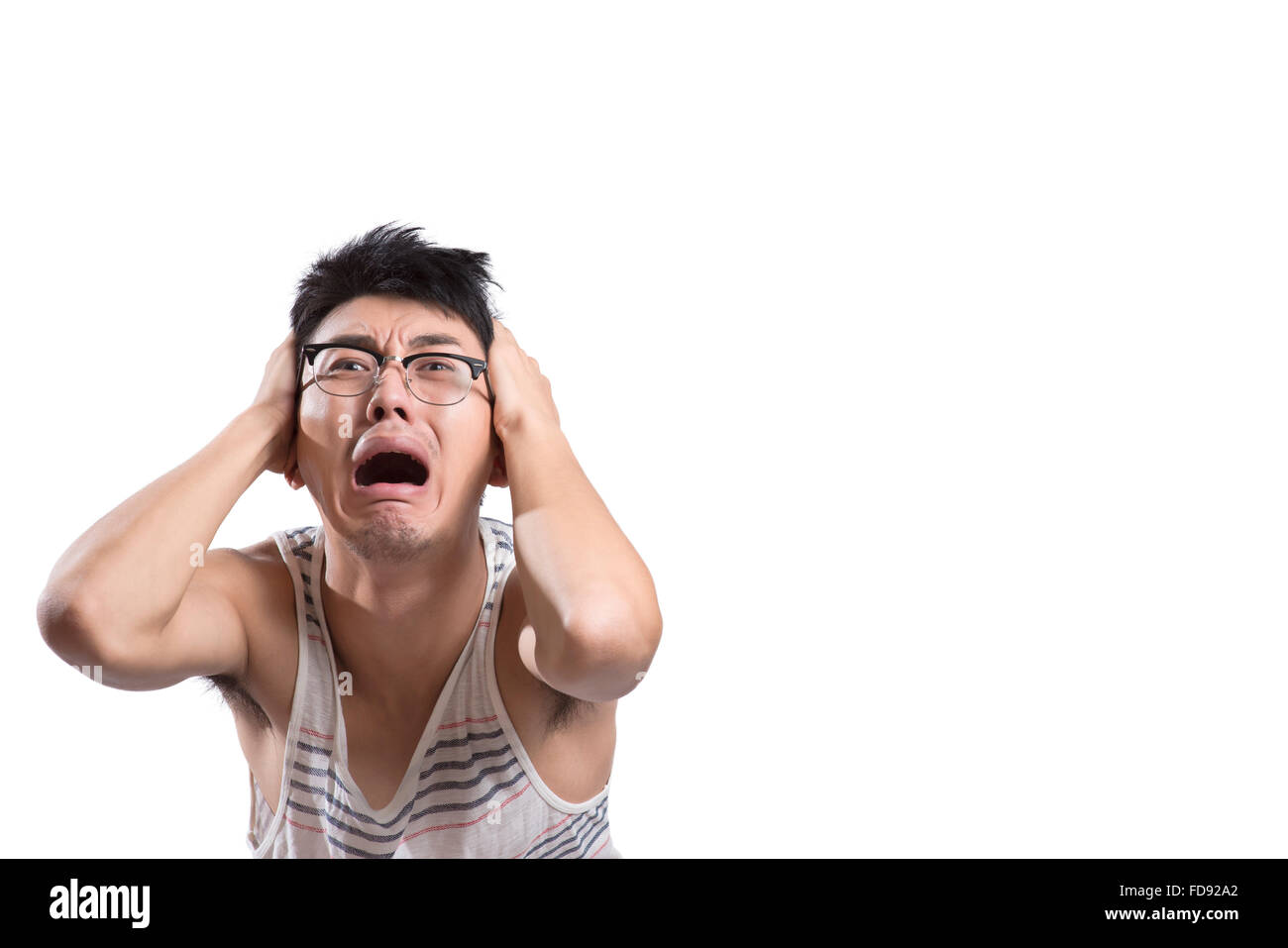 Ritratto di giovane uomo inorridito Foto Stock