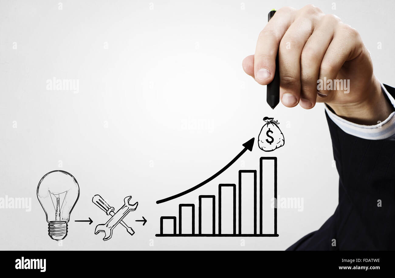 Close up di imprenditore disegno per far soldi formula Foto Stock
