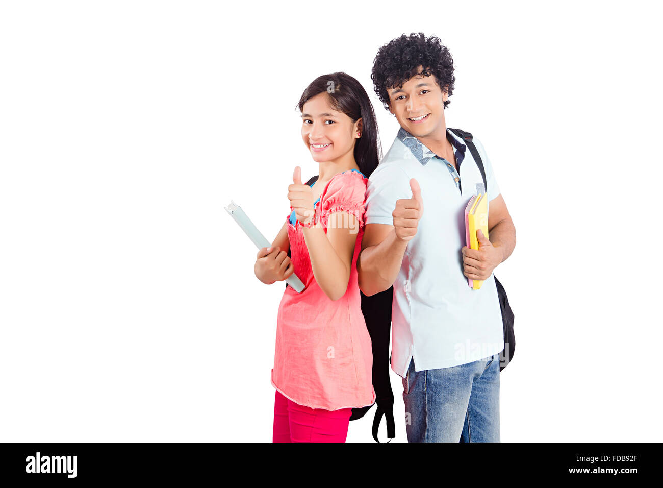 2 adolescenti studente amici dell'Università di schiena in piedi pollice in alto mostra Foto Stock
