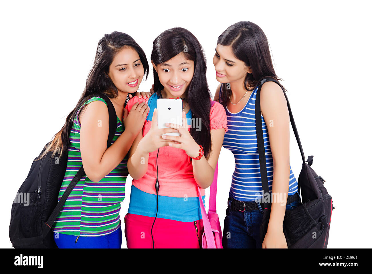 3 ragazze adolescenti amici studente di college di telefono cellulare messaggio lettura sorpresa Foto Stock