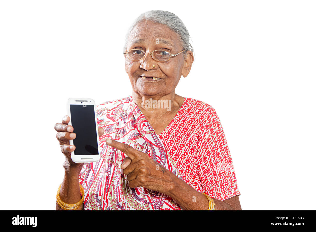 1 Senior donna adulta permanente di pensionamento Telefono Mobile qualità puntare il dito che mostra Foto Stock
