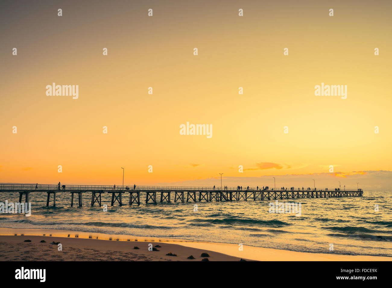 Port Noarlunga tramonto, South Australia. Colore effetti tonificanti applicato Foto Stock