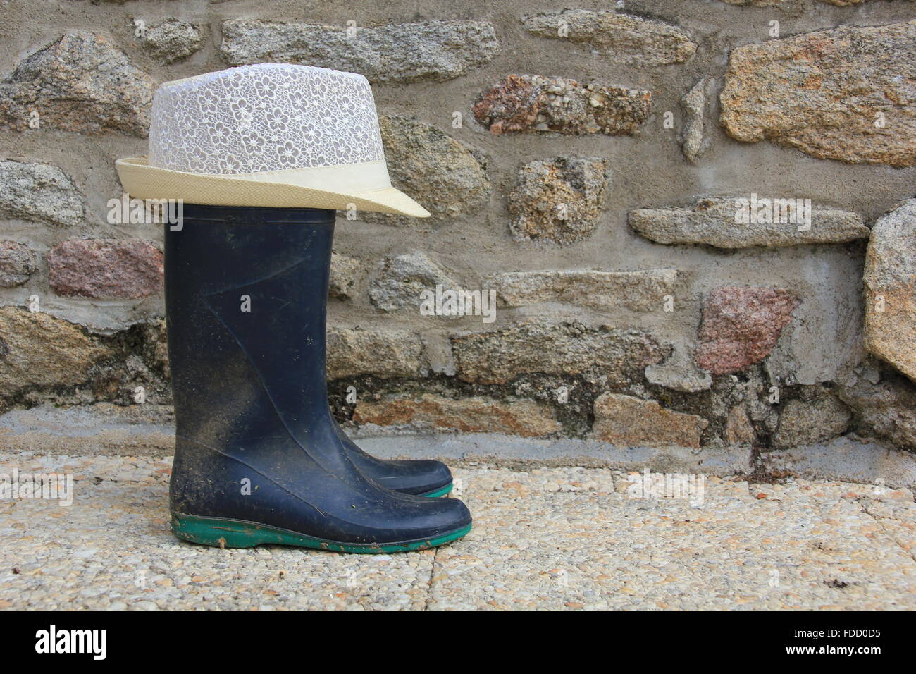 Gli agricoltori gumboots Foto Stock