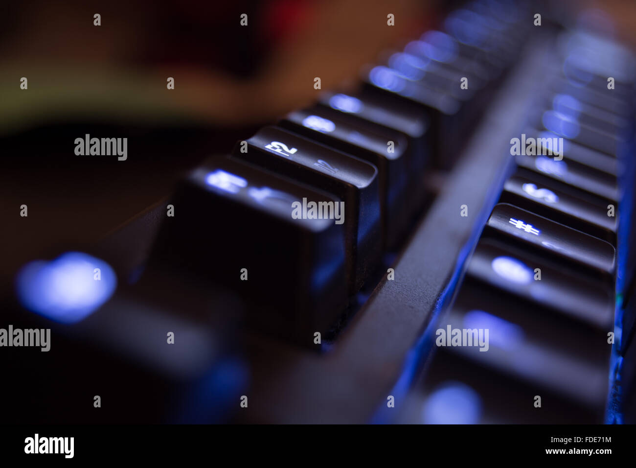 Una foto dei tasti funzione su una retroilluminazione tastiera meccanica. Foto Stock