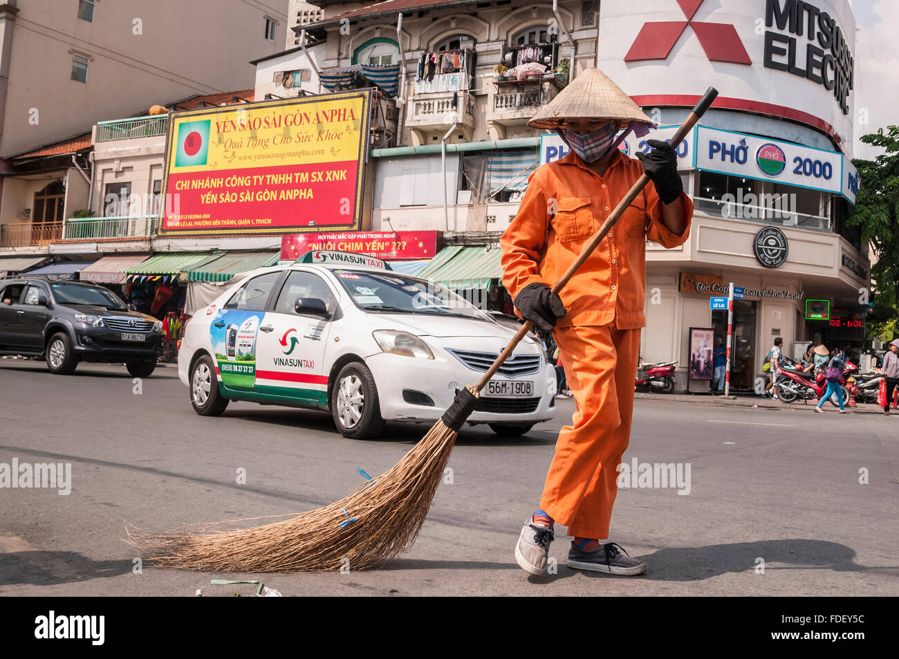 Spazzatrice stradale ho Chi Minh città. Saigon. Vietnam. Vietnam. Asia orientale. Foto Stock