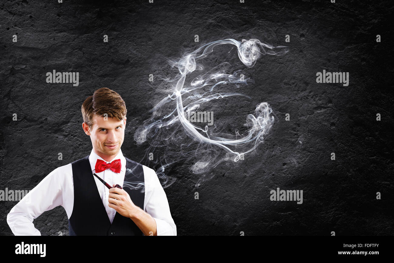 Bel giovane imprenditore tubo di fumo. Fare Soldi Foto Stock