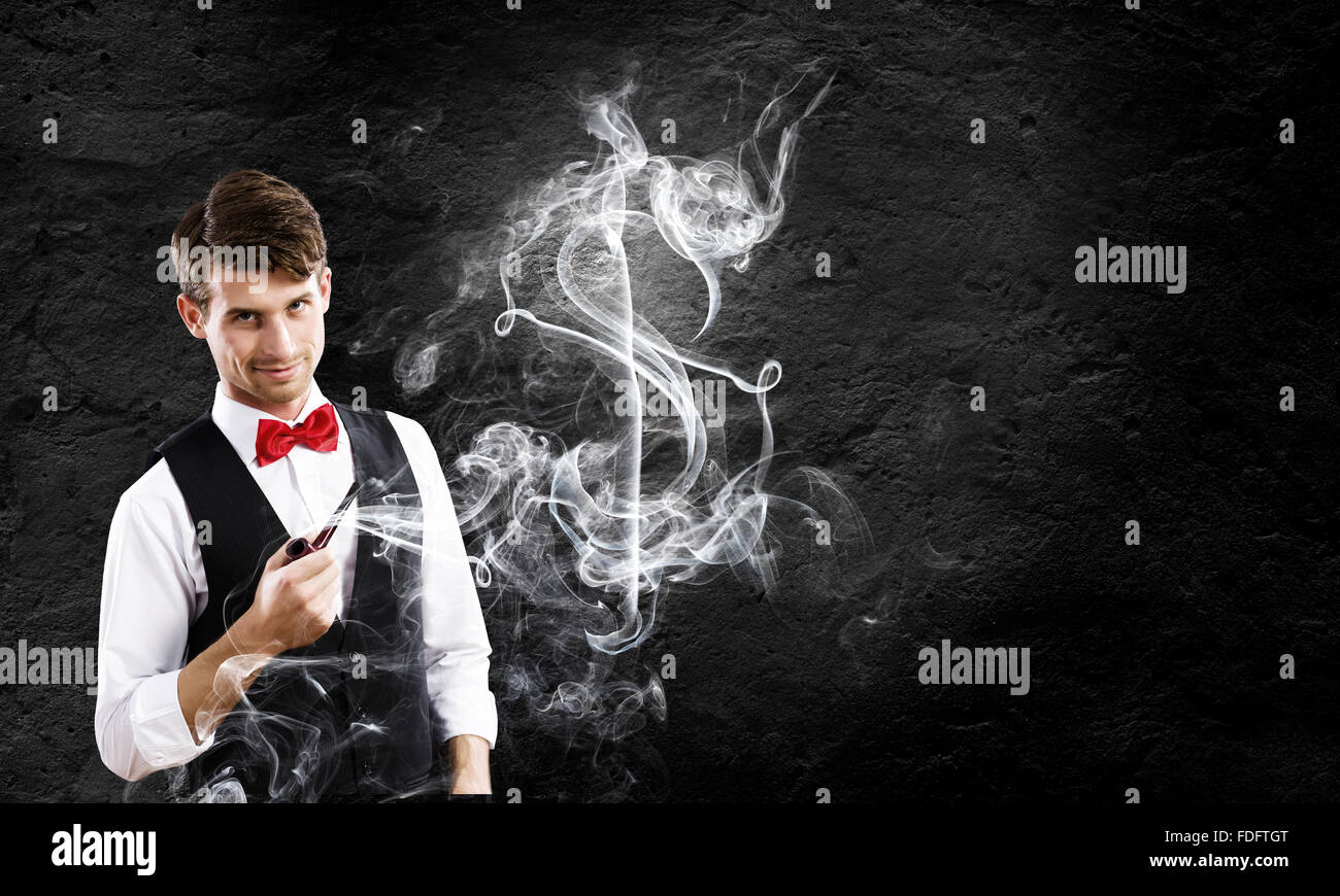Bel giovane imprenditore tubo di fumo. Fare Soldi Foto Stock