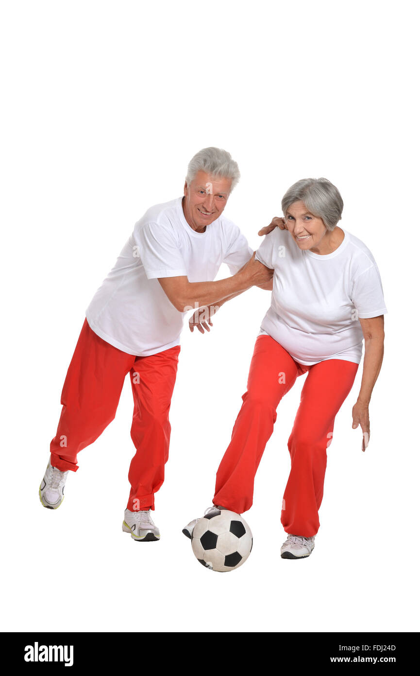 Coppia senior con una sfera Foto Stock