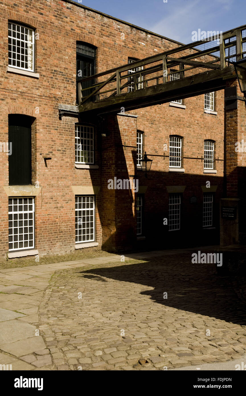 Parte del mulino edifici di Quarry Bank Mill, Styal, Cheshire. Il mulino è stato fondato nel 1784 e prodotto il cotone fino agli anni cinquanta l. Foto Stock