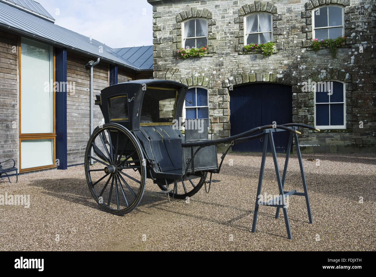 Una cabina hansom, parte del NT Carrello raccolta museale alla Corte di Arlington, Devon. Foto Stock