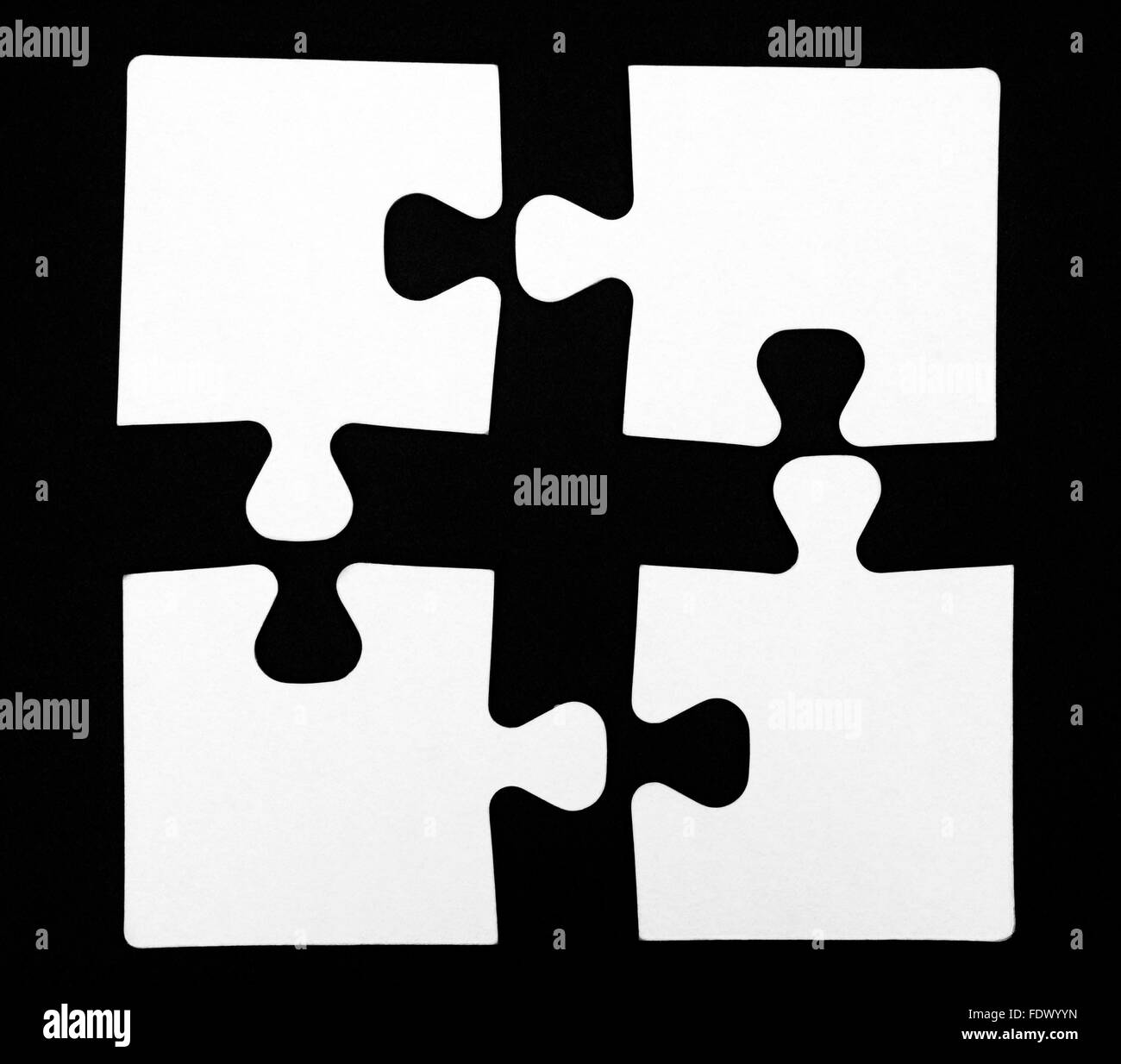 Semplice puzzle su sfondo nero Foto Stock