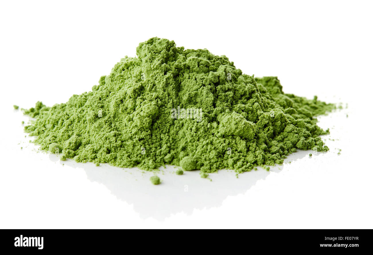 Cumulo di giovani di orzo o di erba di frumento, detox super, sfondo bianco Foto Stock