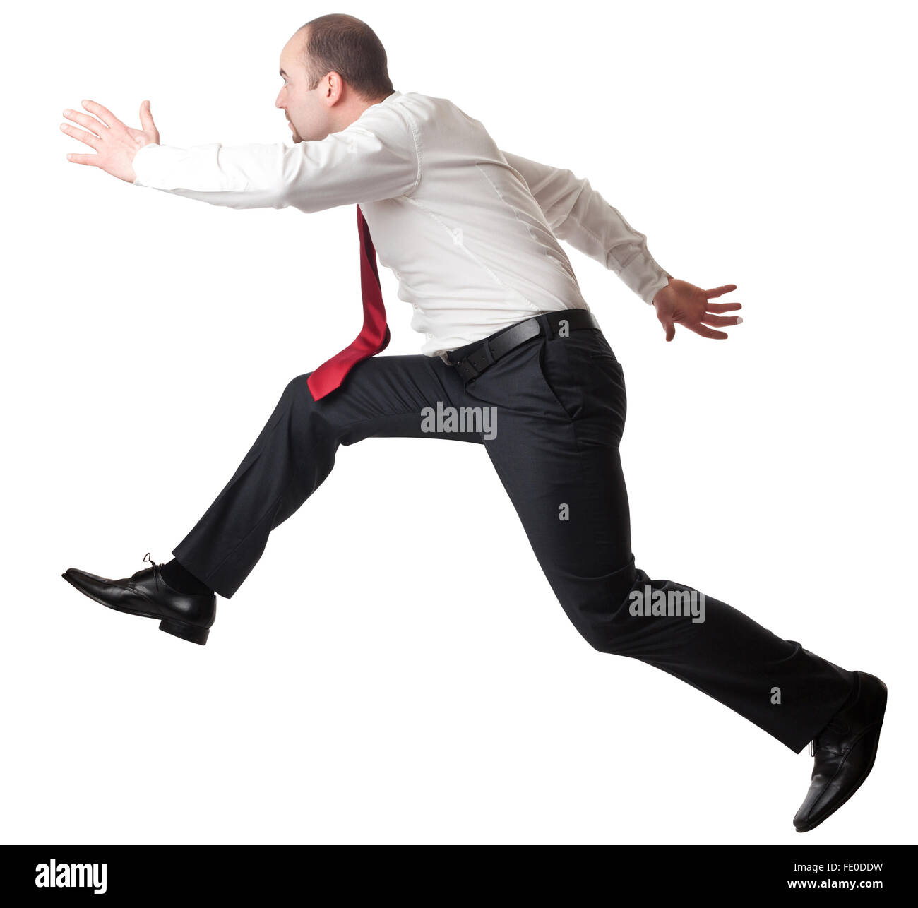 Jumping uomo isolato su bianco Foto Stock