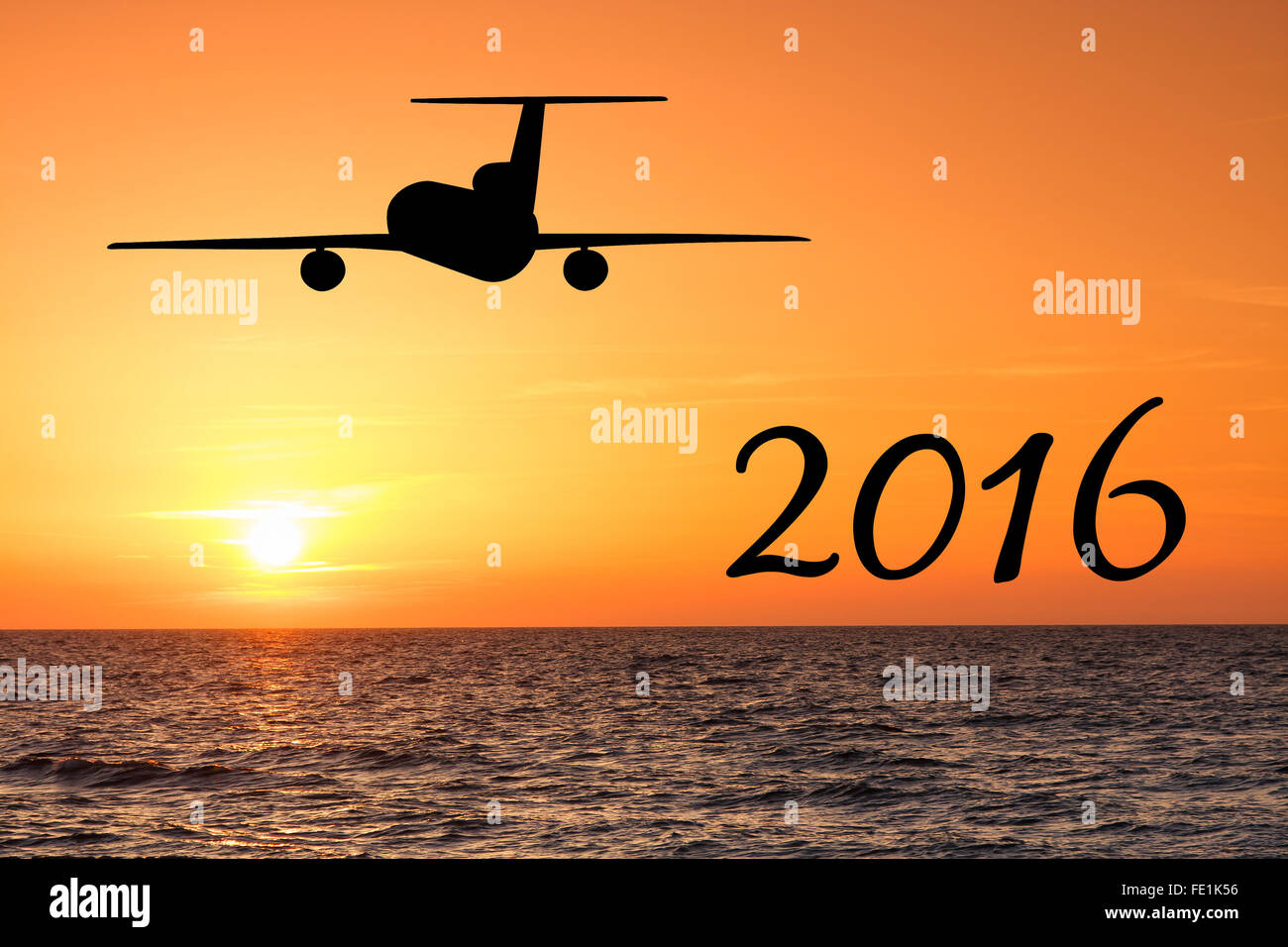 2016 il concetto di vacanza. Aeroplano e tramonto sul mare Foto Stock