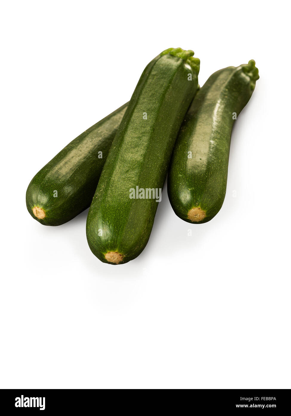 Zucchine organici isolati su sfondo bianco Foto Stock