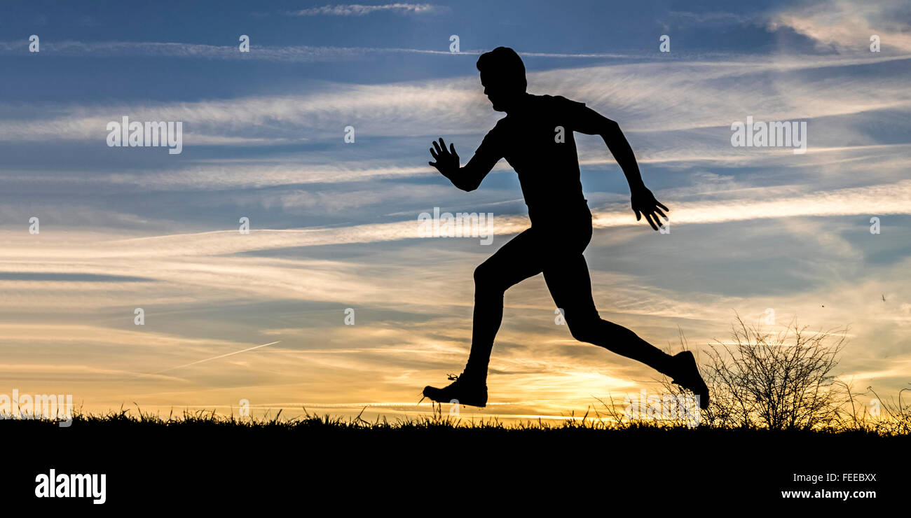 Silhouette, cielo notturno, running man Foto Stock