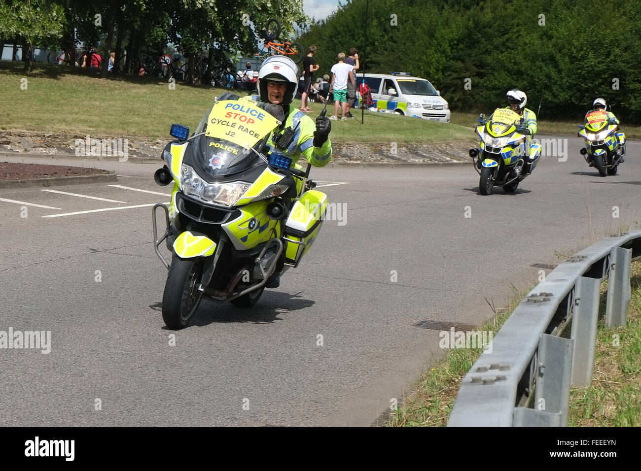 Polizia di scorta in moto per il tour de France mentre viaggiate attraverso Cambridgeshire, Luglio 2014 Foto Stock