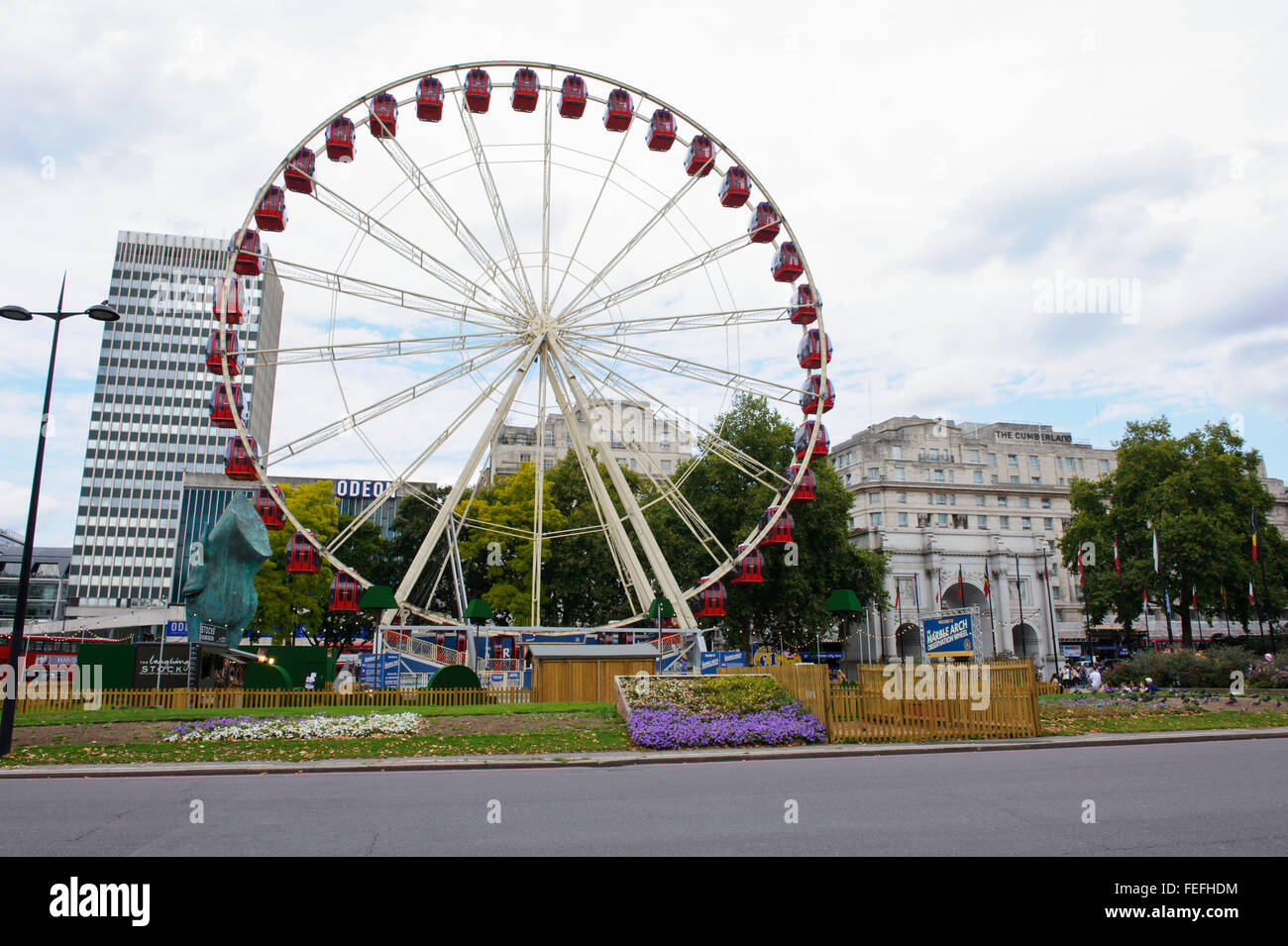 Un grande divertimento ruota in Marble Arch a Londra, Regno Unito. Foto Stock