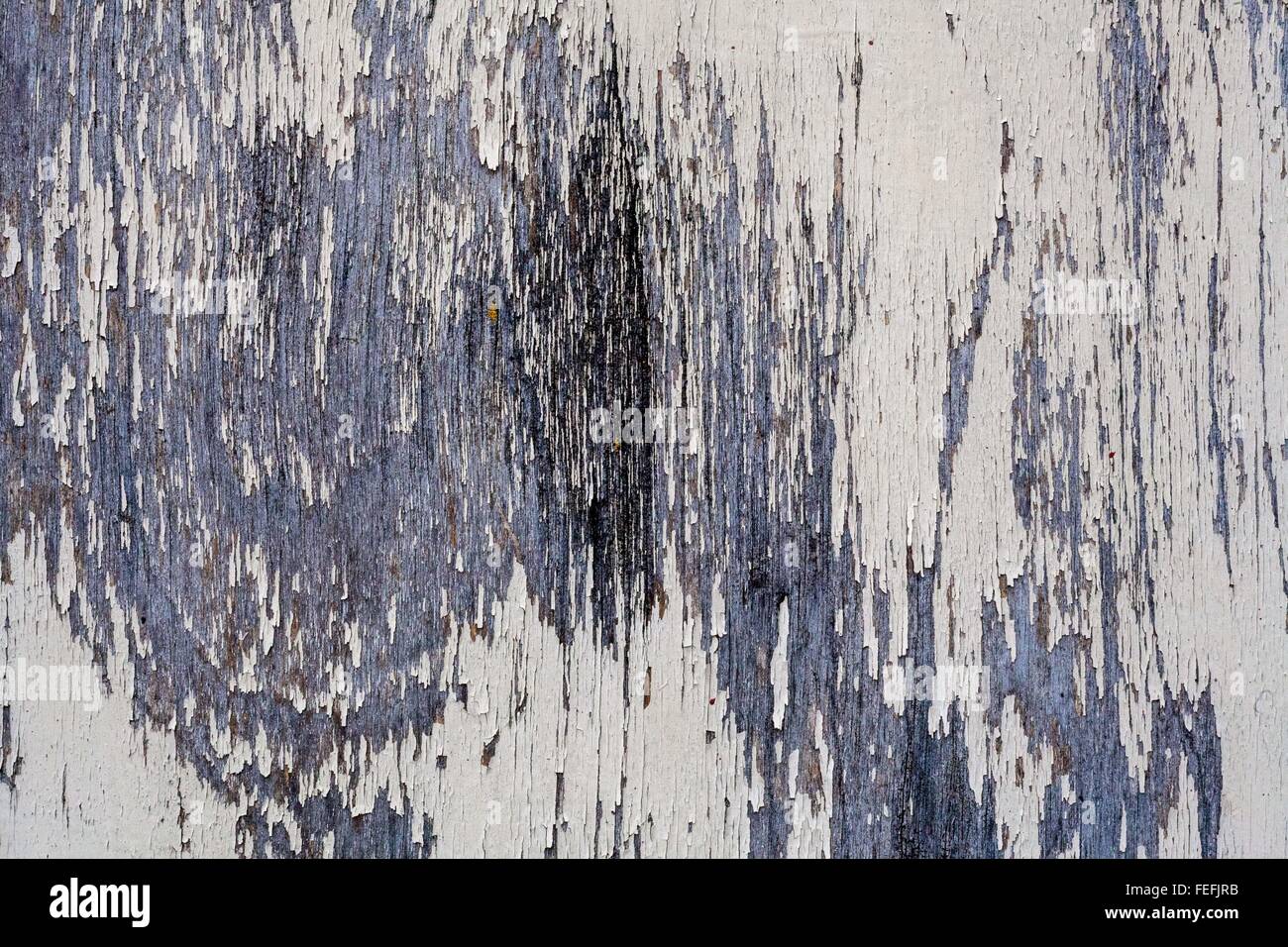 Arrugginita blu e bianco scolorite dal tempo la texture della superficie metallica. worm e corroso nel tempo Foto Stock