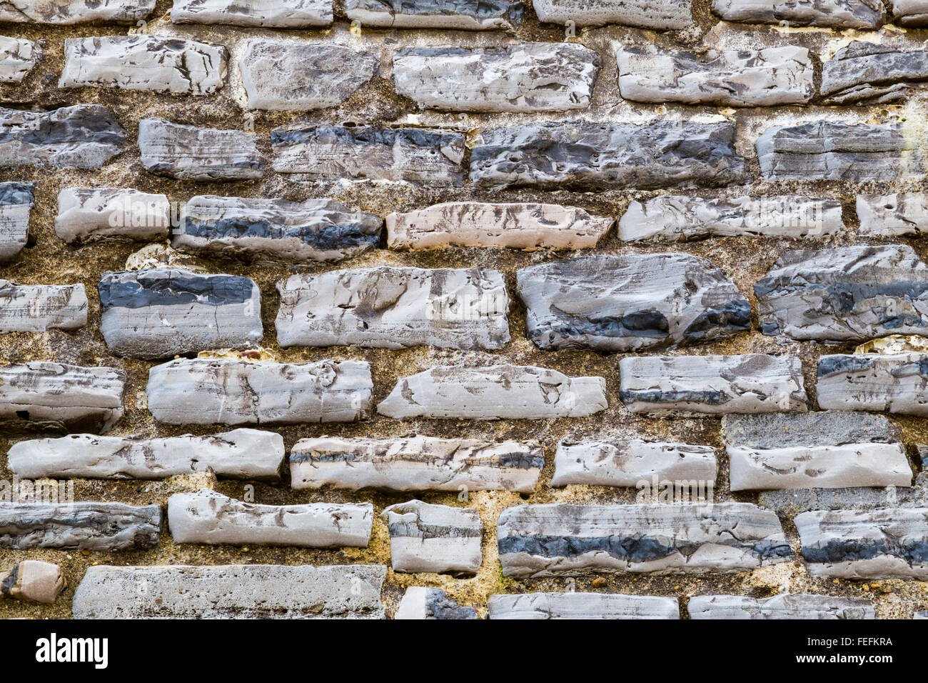 Mare di granito texture a parete Foto Stock