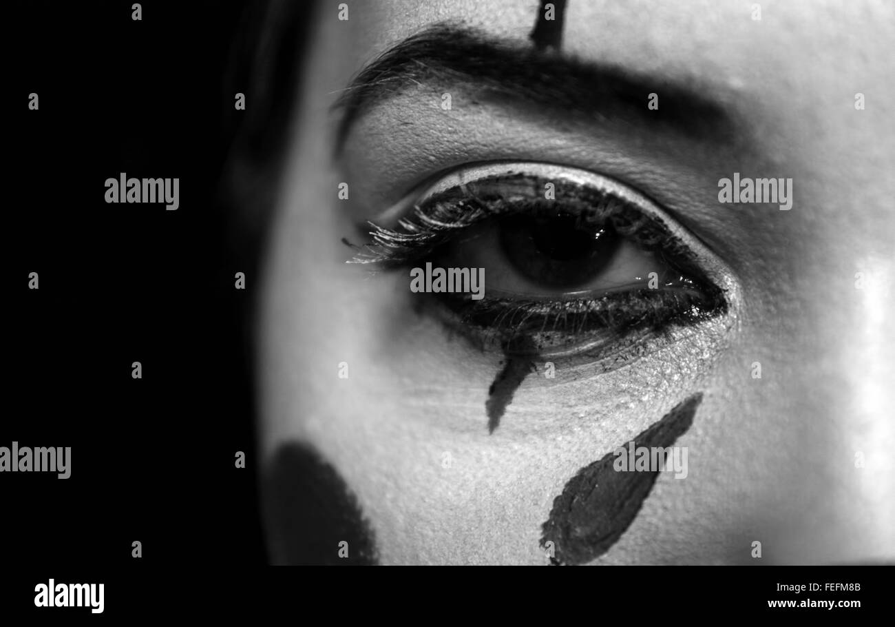 In bianco e nero fino in prossimità di una metà di un volto di donna Foto Stock