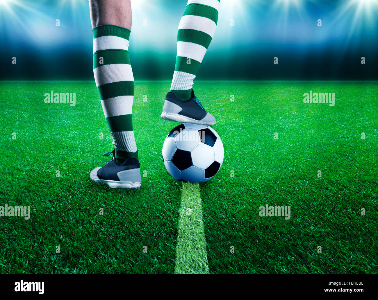 Football-player sul terreno di calcio Foto Stock