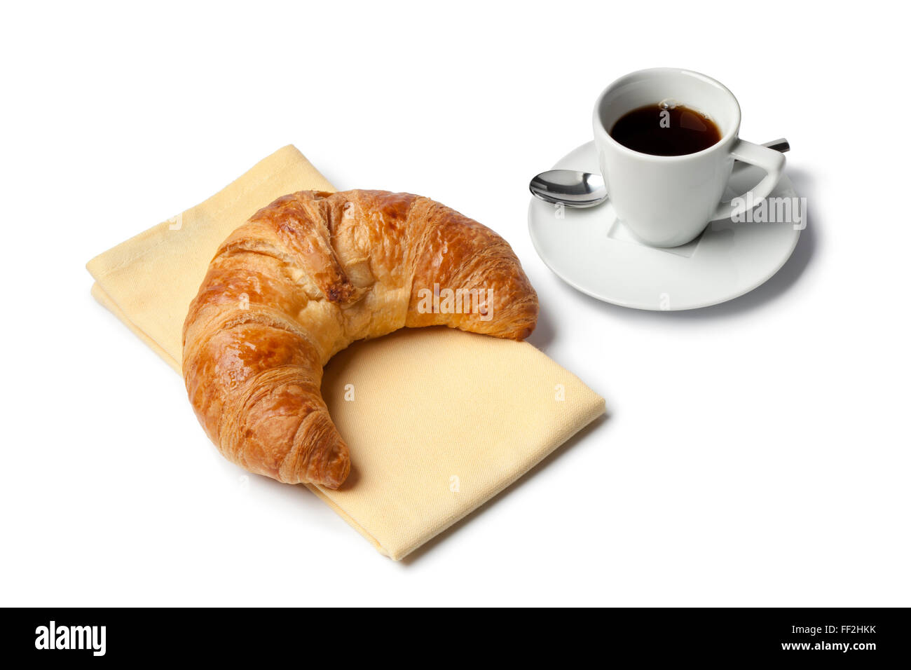 La prima colazione con croissant francesi e caffè espresso su sfondo bianco Foto Stock