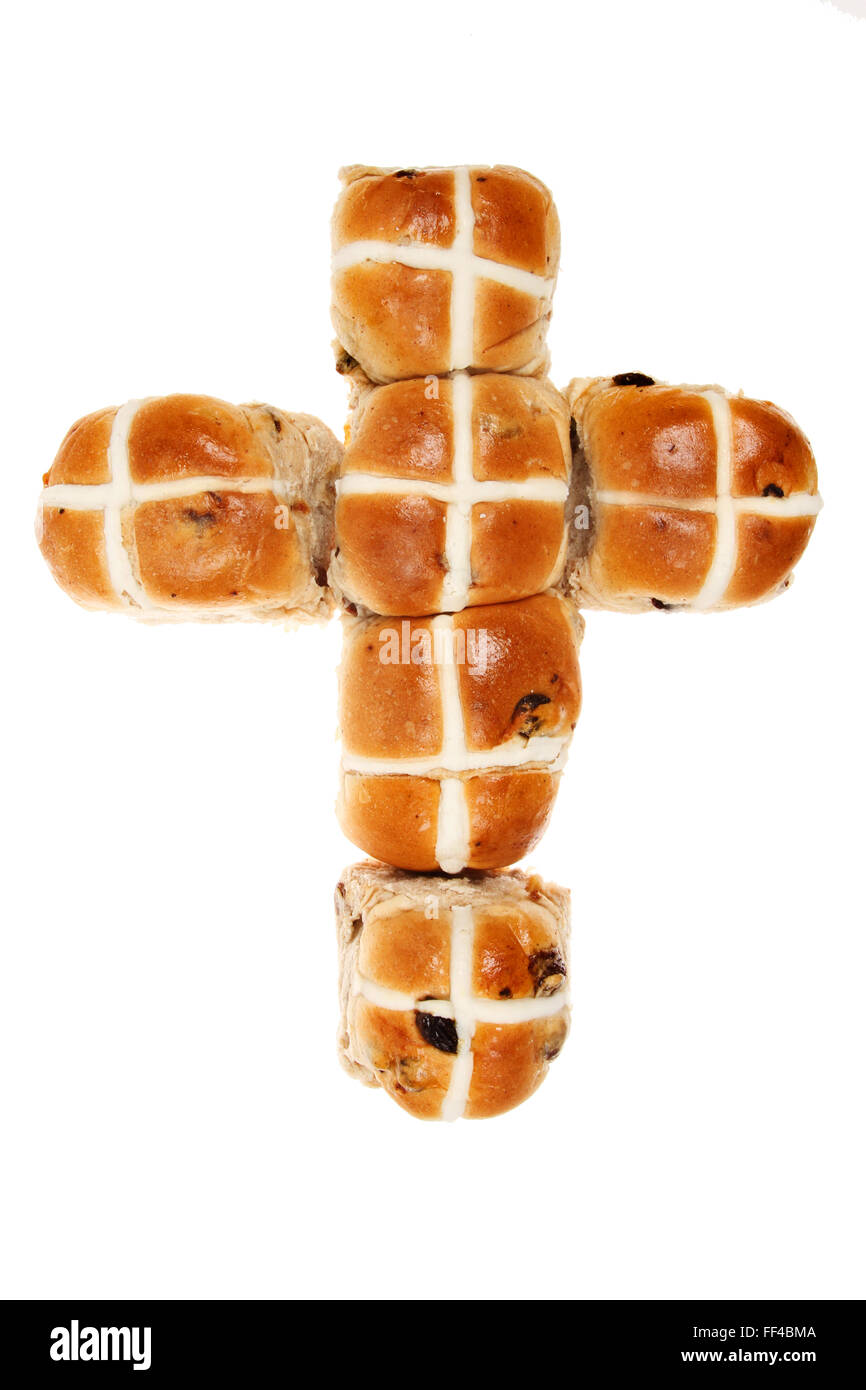 Hot cros panini a forma di croce isolata contro bianco Foto Stock